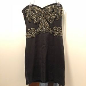 Black beaded body con dress